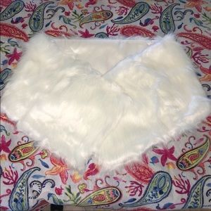 8 women’s fur muffs